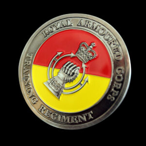 Royal Armoured Corps Training Regiment (RACTR) challenge coin featuring a silver antique finish with red and yellow enamel detailing, crowned gauntlet emblem and regimental insignia. A bespoke military challenge coin designed to recognise service, achievement and regimental identity.