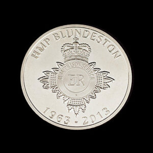 HMP Blundeston commemorative coin in a silver finish featuring the Prison Service insignia, royal crown emblem and the dates 1963–2013. A bespoke commemorative coin created to mark the prison’s 50th anniversary and recognise its history, service and contribution to the UK justice system.