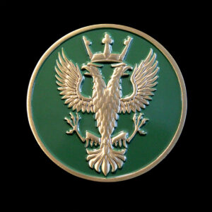 Custom Mercian Regiment commemorative coin featuring a detailed heraldic eagle emblem in raised metal on a green enamel background. Crafted as a bespoke military challenge coin for recognition, achievement and commemorative presentations.